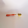 Gold wax melting spoon by Papier Plume, small metal spoon for wax melting and application, with a shiny gold finish.