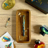Esterbrook x BUNGUBOX Kingfisher Limited Edition Estie fountain pen with vibrant blue and gold accents, displayed on a white background.
