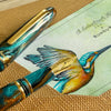 Esterbrook x BUNGUBOX Kingfisher Estie fountain pen with blue and gold accents, shown on a white background.