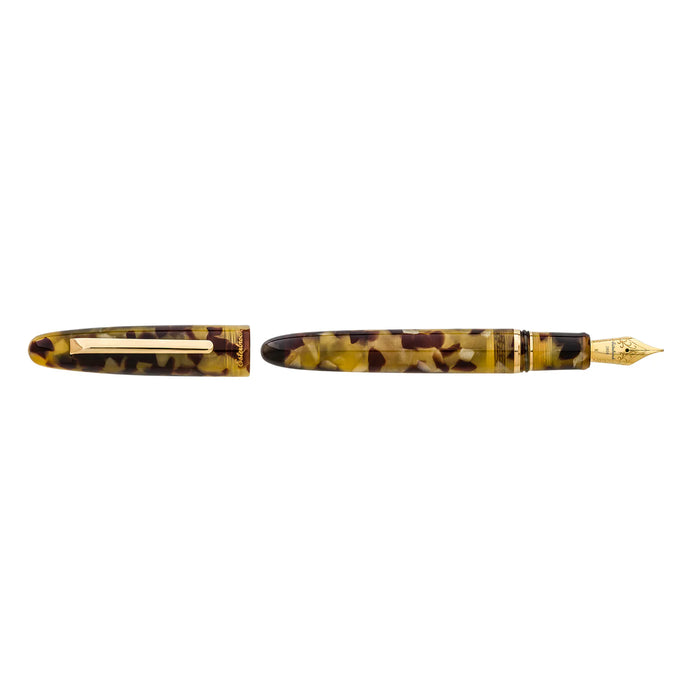 Esterbrook Estie fountain pen with tortoise shell body and gold fittings, showcasing elegant design and craftsmanship.