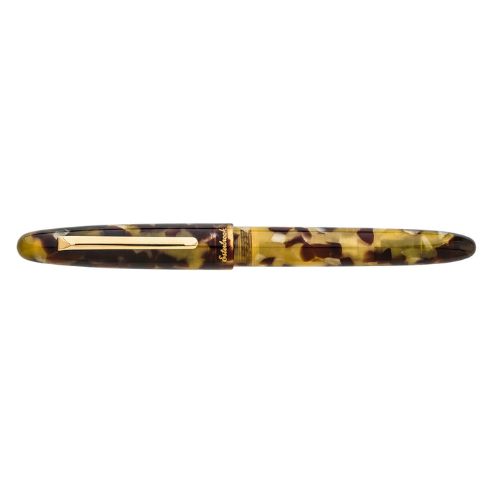 Esterbrook Estie fountain pen with tortoise shell pattern and gold fittings, showcasing the elegant pen body and cap details.