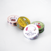 Decorative Papier Plume washi tape roll with colorful geometric patterns, ideal for crafts and scrapbooking projects.