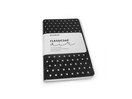 Zequenz Journal Classic 360 Air in black, compact leather cover, with pages open displaying lined paper for note-taking and journaling.
